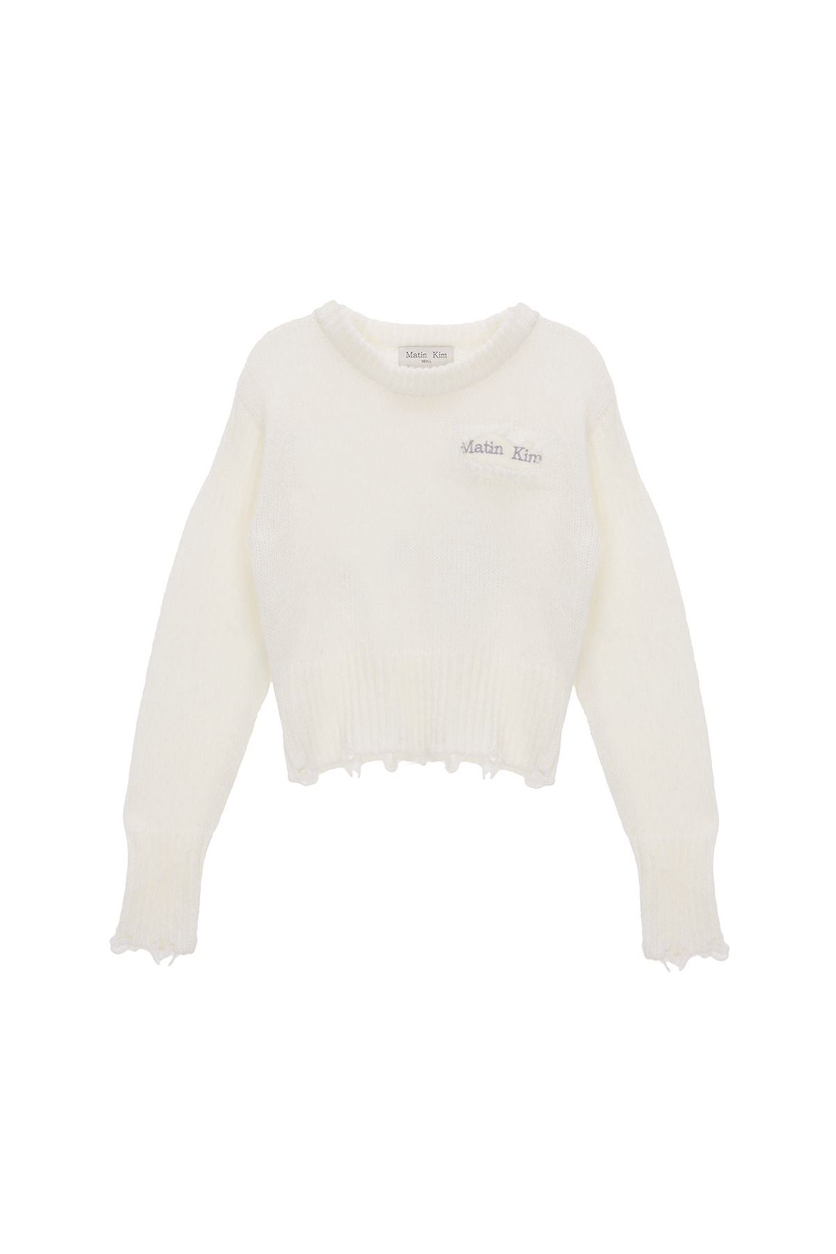 DAMAGE SOLID KNIT PULLOVER IN IVORY