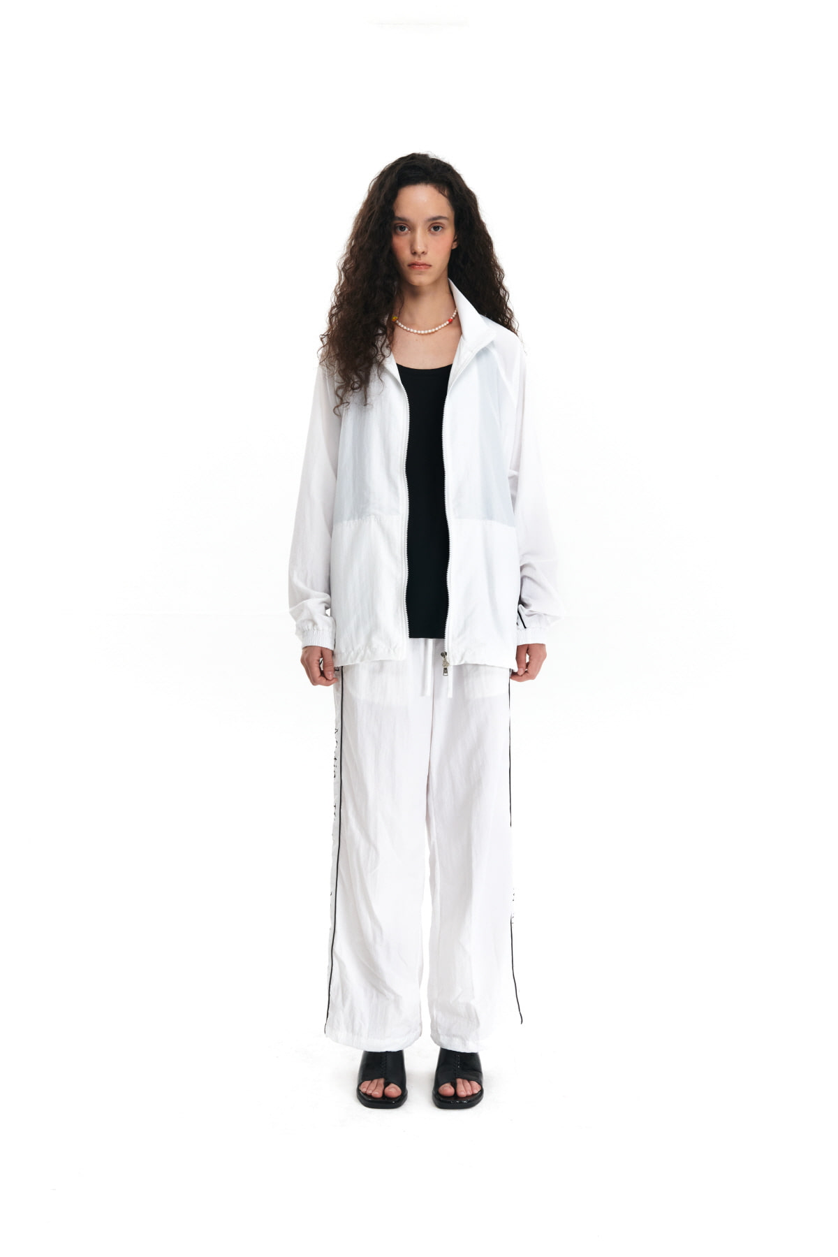 MATIN SPELL TRACK PANTS IN WHITE