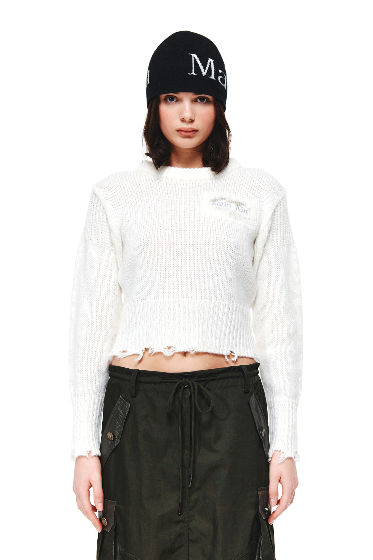 DAMAGE SOLID KNIT PULLOVER IN IVORY